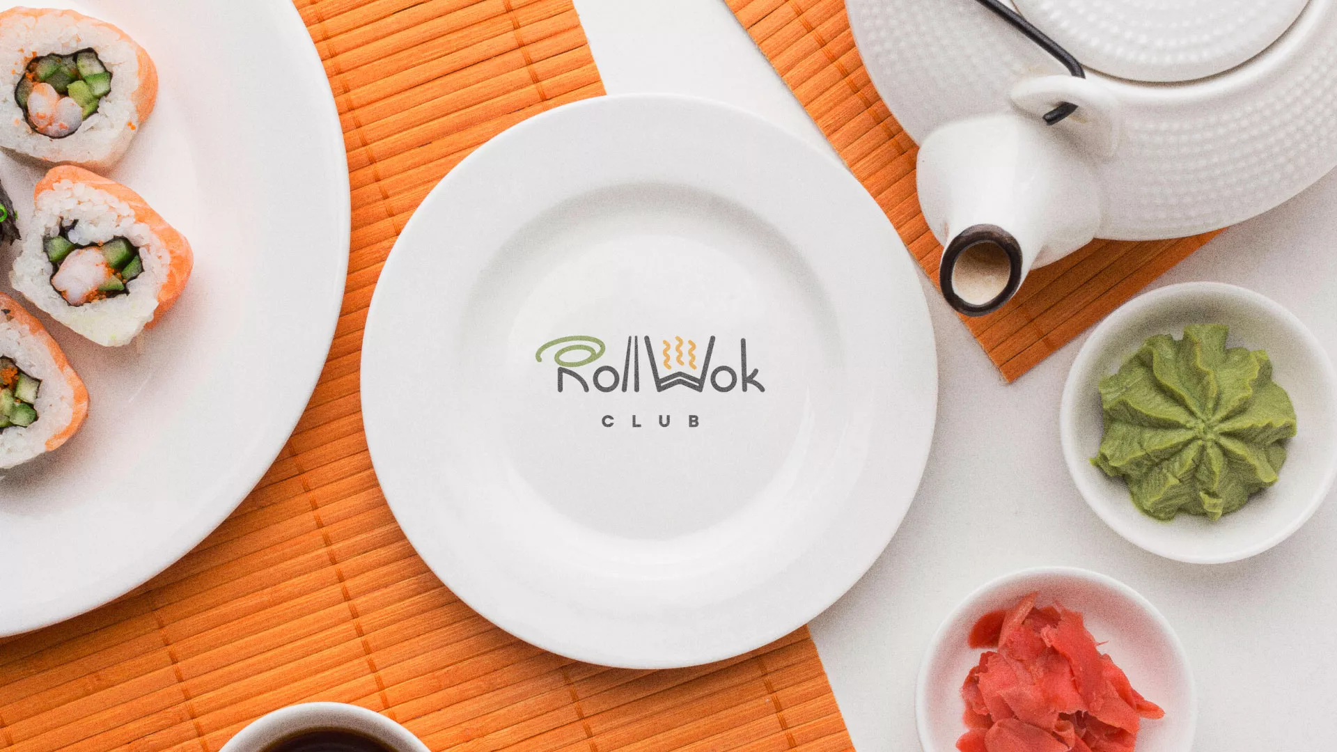 Разработка логотипа и фирменного стиля в Югорске для суши-бара «Roll Wok Club» Разработка логотипа и фирменного стиля в Югорске для суши-бара «Roll Wok Club»